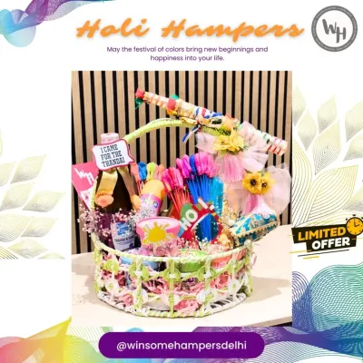 A fun and festive Holi hamper overflowing with goodies. This basket includes a bottle of thandai, water guns, organic colors, and snacks, all decorated with a playful "I came for the Thandai" tag.