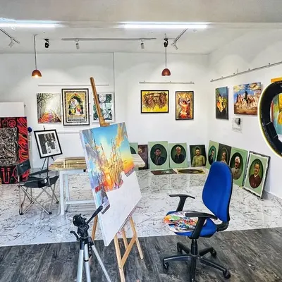 A wide view of my studio, Kamil's Art Studio. This is my dream space, filled with completed works, works in progress, and all my tools.