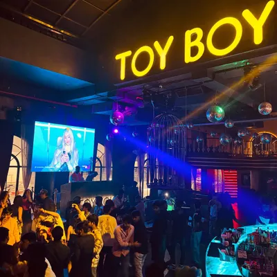 What a night at Toy Boy! The venue's unique decor, including disco balls and cages, provided the perfect backdrop for an unforgettable party.