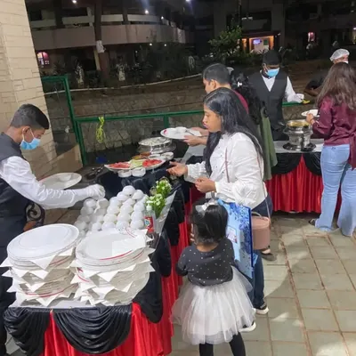 A candid shot from a birthday party we catered for 130 guests. Our team ensures the buffet line is always stocked and tidy, allowing guests of all ages to enjoy the food without any fuss.