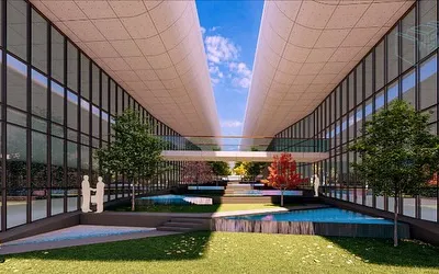 The central green oasis in our 90,000 sq ft textile mill design. The inward-facing shop floor looks onto this courtyard, which creates a wind tunnel effect, providing visual relief and natural cooling from the harsh North Indian heat.