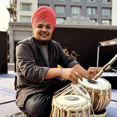 A happy moment during sound check in Indore. This is the time to get comfortable with the stage and the sound before the audience arrives.