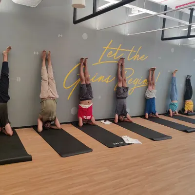 A corporate wellness session at LinkedIn where we worked on wall-supported headstands. It was amazing to see the team support each other and have fun while trying something new.