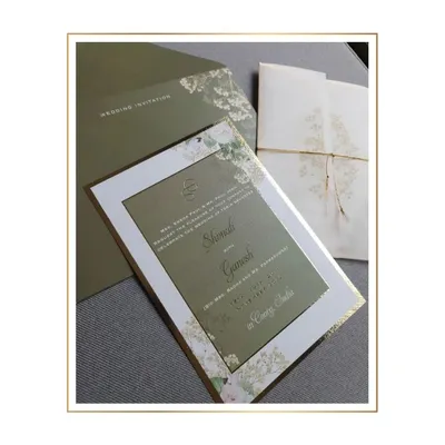 Minimal floral elegance defines this suite. We used a sophisticated olive green and white color palette, with delicate gold foil floral illustrations and a custom monogram for a touch of luxury.