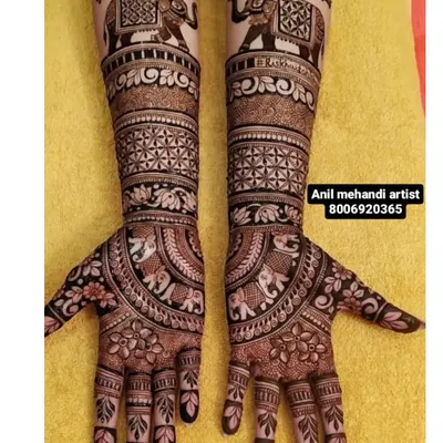 The royal baraat comes alive in this design, featuring majestic elephants carrying umbrellas (chhatris). This is a classic and grand theme for bridal mehendi, symbolizing a royal procession.