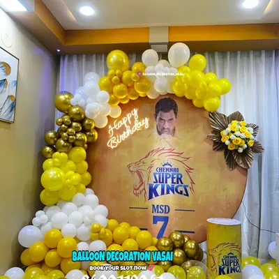 A Chennai Super Kings (CSK) cricket theme for an MSD fan. The yellow and gold balloon decor and custom backdrop are perfect for a sports-themed birthday.