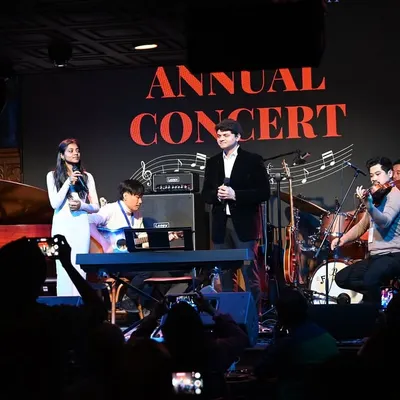 A glimpse of the magic at our Annual Concert. Here, our students perform a vocal duet, backed by a full band of instructors and fellow students. These concerts are a celebration of the hard work and collaboration that defines our community.