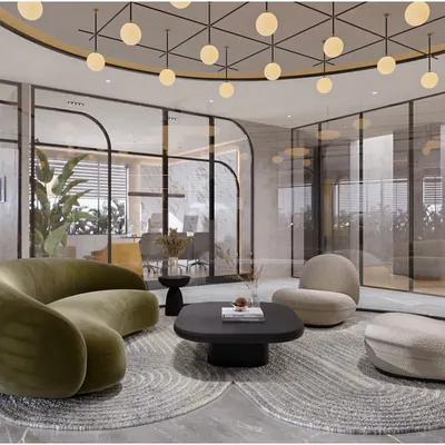 The head office for All Services Global was designed to foster an energetic and community-driven environment. This lounge area, with its curved sofa and modern lighting, serves as a comfortable and stylish space for informal meetings and collaboration.