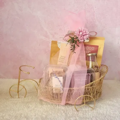 A touch of elegance in this whimsical golden tricycle basket. It's filled with our gourmet treats and beautifully wrapped, making it a unique and memorable gift.