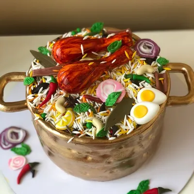 Yes, that's a cake! I had so much fun creating this hyper-realistic Biryani Handi cake. Every detail, from the rice grains to the chicken legs and spices, is completely edible.