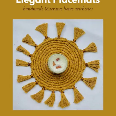 This elegant, sun-shaped macrame placemat in a warm mustard yellow is perfect for creating a statement table setting. The design features a tightly woven center with tassel-like spokes, adding a unique, handmade aesthetic to your home.