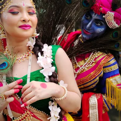 A creative depiction of Radha and Krishna for a Janmashtami-themed shoot. This showcases my skills in character makeup, using body paint and traditional elements to bring a divine story to life.