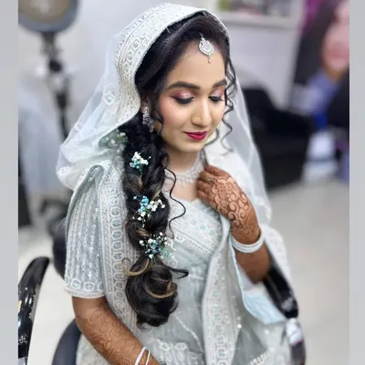 My lovely engagement client, looking beautiful in a light blue embroidered outfit with a mermaid braid.