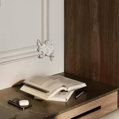 A 3D design render showing a close-up of a study nook within a living room. This visualization helps in planning details like decorative molding and material finishes.