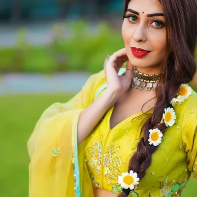 A close-up of the Baisakhi festive look, highlighting the intricate embroidery on the blouse and the modern choker. The styling combines traditional elements with contemporary jewelry for a fresh take on festive wear.