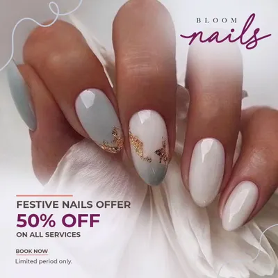 A beautiful and elegant design featuring milky white and pale blue-grey nails with delicate gold foil accents. This is a perfect example of a sophisticated look for any occasion.
