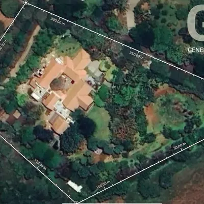 An aerial site plan of a 3-acre sustainable project. This view shows the scale of our ecological commitment, including large-scale planting of native trees, water management systems, and creating a habitat that supports local birdlife.