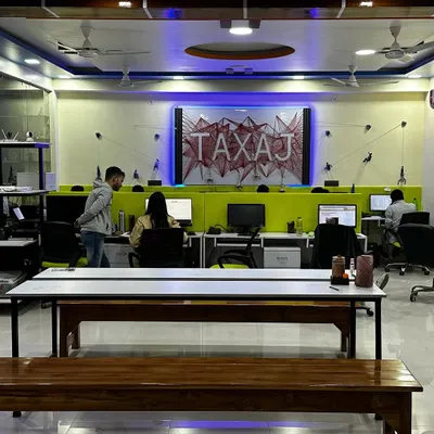 **The Hub of Activity: Our Delhi Head Office.** A view of our main workspace where our team of CAs, CSs, and legal experts collaborate to provide seamless service to our clients. The energy and dedication here are what drive us forward.