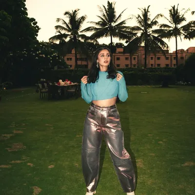 A pop of color for the stage. This custom blue top paired with metallic pink pants for Dhvani is all about creating a fun, high-energy look that shines under the lights.