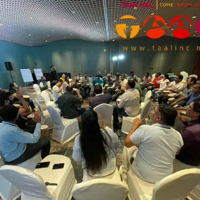 This is what it looks like when an entire team is focused on one goal, one rhythm, without even realizing it. Our corporate drum circles are designed to create harmony and innovation, all while everyone is just having fun.