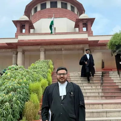 Standing before the Supreme Court of India, where we fought to uphold a democratic mandate. Our client, an elected official, was blocked from serving despite three lower court victories. We invoked Article 32, arguing that defying judicial orders suspends democracy itself. The Supreme Court agreed, ordering his immediate reinstatement.