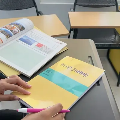 Our "IFLAC Junior" workbook, designed to make language acquisition for young learners an engaging and supportive experience.
