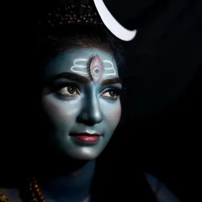 A profile view of my Lord Shiva makeup, highlighting the contouring and shading used to create a powerful facial structure. The dramatic lighting emphasizes the divine and formidable nature of the character.