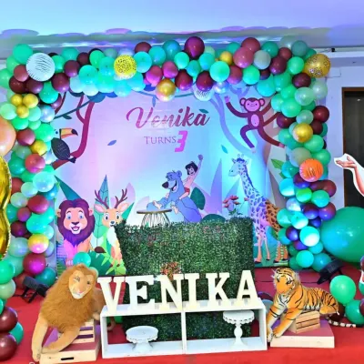 We brought the jungle to life for Venika's 3rd birthday with this Jungle Book theme. The setup included a vibrant backdrop, balloon garlands, and life-sized animal props to complete the look.