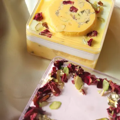 My two most popular fusion dessert tubs: the Rasmalai Tres Leches and the Rose Tres Leches. Both are topped with pistachios, rose petals, and edible gold.
