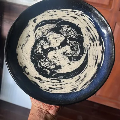 This incredible Sgraffito plate was made by a student. The detail and artistry are just amazing to see.