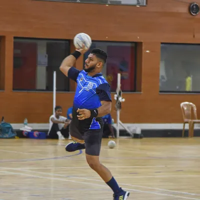 This is the definition of explosive power. I froze this player mid-air as he prepared to unleash a jump shot, capturing the peak of his athletic ability during a training session.