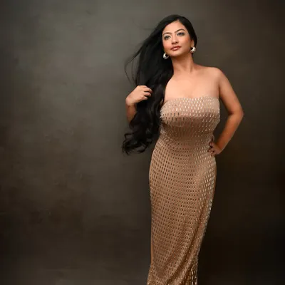 For an actor's portfolio, a glamour shot is essential. With her hair catching the breeze, this portrait exudes confidence and star quality, perfect for a leading role.