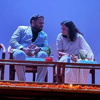 On stage during a panel discussion at ITM Kharghar. Engaging in dialogue with other experts is crucial for exploring how ancient knowledge can solve modern problems.