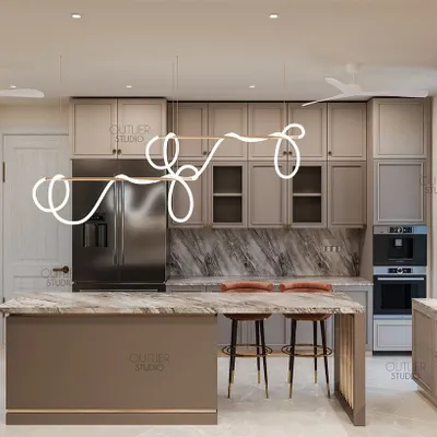 Elevate your culinary experience with this luxurious kitchen, where functionality meets luxe in every detail. The design features a marble island, modern cabinetry, and a whimsical, sculptural light fixture.