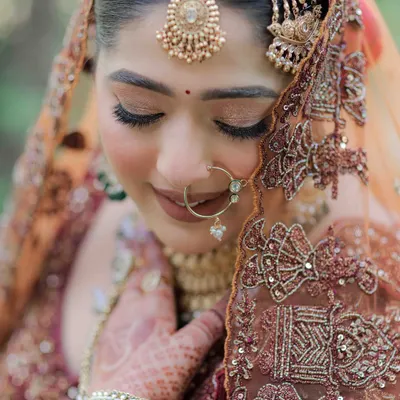 A close-up of my signature bridal makeup. I teach my students how to create this soft, shimmering eye look with flawless skin that looks absolutely radiant in professional photos.