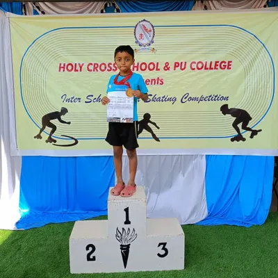 A proud moment for our champ Reyansh, standing tall on the first-place podium with his gold medal at the Holy Cross School inter-school competition.