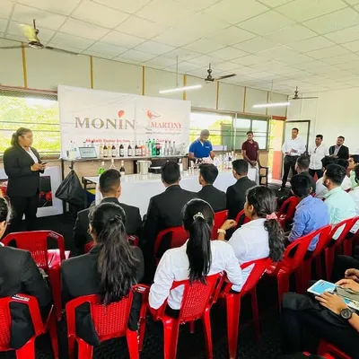A full classroom of hospitality students attending our mocktail masterclass, conducted in partnership with Monin India.