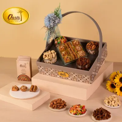 This elegant grey hamper basket is perfect for a sophisticated gift. Filled with my signature baklava, assorted nuts, and candied fruits, it's a versatile choice for anniversaries, birthdays, or corporate thank-yous.