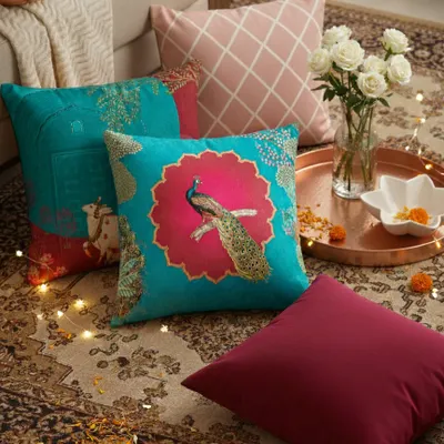 For the festive season, I designed this Pichwai cushion collection to bring home the charm of tradition. The vibrant peacock motif and rich colors are a celebration of timeless Indian art and festive elegance.