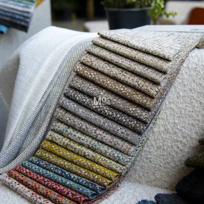 A well-crafted moodboard is the foundation of any beautiful space. This image shows a selection of our textured fabrics, which help us visualize the final look and ensure every detail aligns perfectly with your vision.