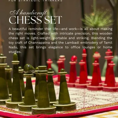 A beautiful reminder that life and work are all about making the right moves. This handcrafted wooden chess set blends the toy craft of Channapatna and the Lambadi embroidery of Tamil Nadu, bringing elegance to any study or lounge.