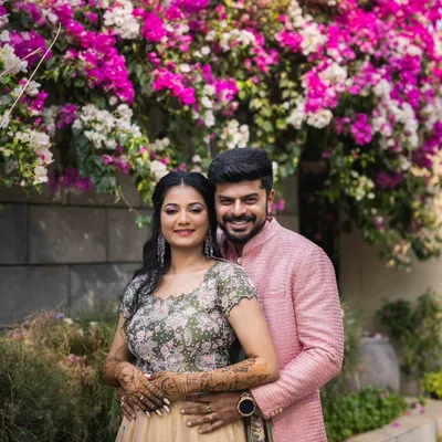 A beautiful collection of photos from Disha and Sumanth's pre-wedding shoot. Her makeup is soft and romantic, perfect for these candid and posed shots in a lovely garden setting.