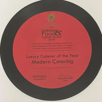 The 'Luxury Caterer of the Year' award from the Delhiites Food & Nightlife Awards 2025. This recognition reinforces our position as a leader in high-end catering in India.