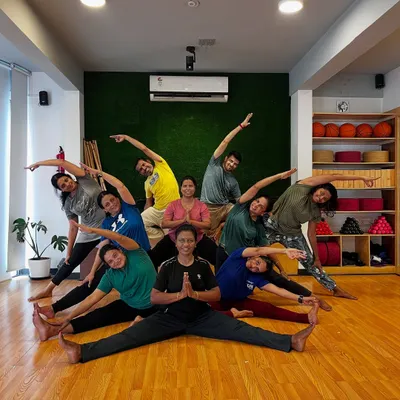 Flex, stretch, and laugh. A beautiful group pose that captures the harmony and connection of our Friday asana practice.