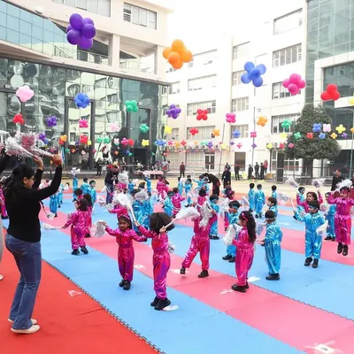 The school grounds come alive with color and energy during Khelchakra. Here, our students perform a synchronized drill with pom-poms, showcasing their coordination and team spirit.
