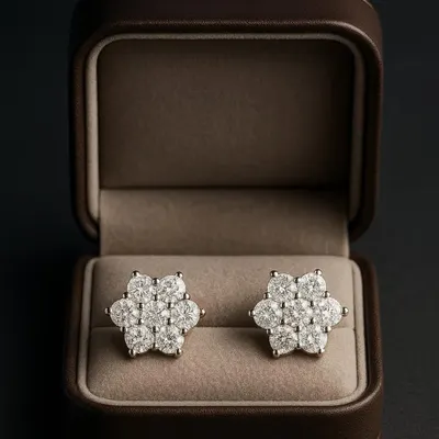 Unveil the timeless beauty of these diamond stud earrings. Designed as a floral cluster, they are crafted with precision to be more than just accessories. They are a reflection of sophistication and grace, presented in a classic leather box.