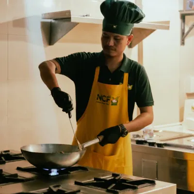 Here I am in my element, devising new recipes and perfecting the old ones in the NCF kitchen.