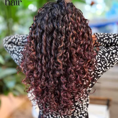 This stunning result was achieved with a no bleach hair colour. The deep red and violet tones add incredible richness and dimension to her dark hair.