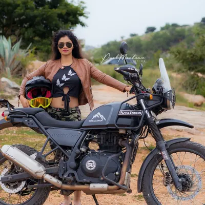 Ready for an adventure. This shot combines a love for biking with a strong, confident pose, creating a powerful lifestyle portrait for the modern adventurer.