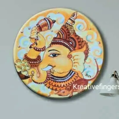 A traditional Kerala mural painting of Lord Ganesha on a round stretched canvas. This style uses a specific color palette and detailed line work to depict spiritual figures, and it's a beautiful way to honor my cultural roots.
